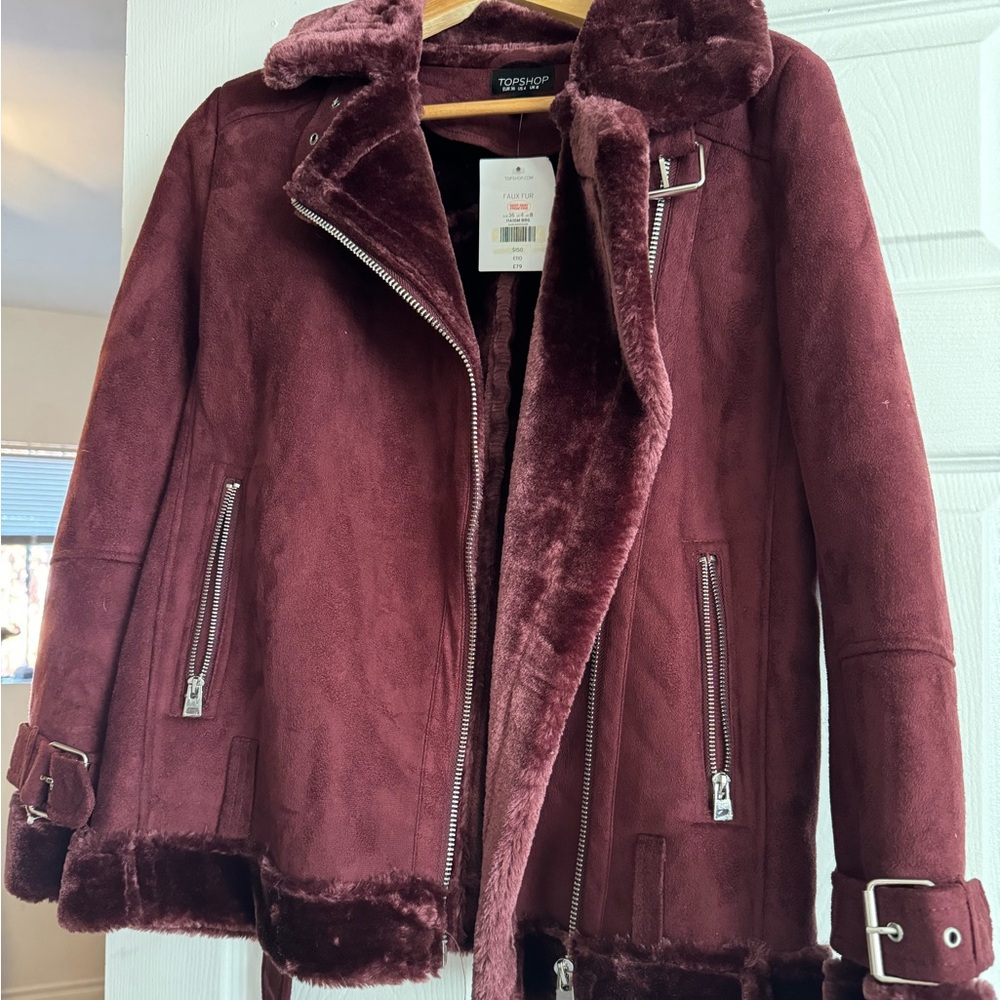 Beautiful jacket burgundy color I loved it but end up not wearing it at all